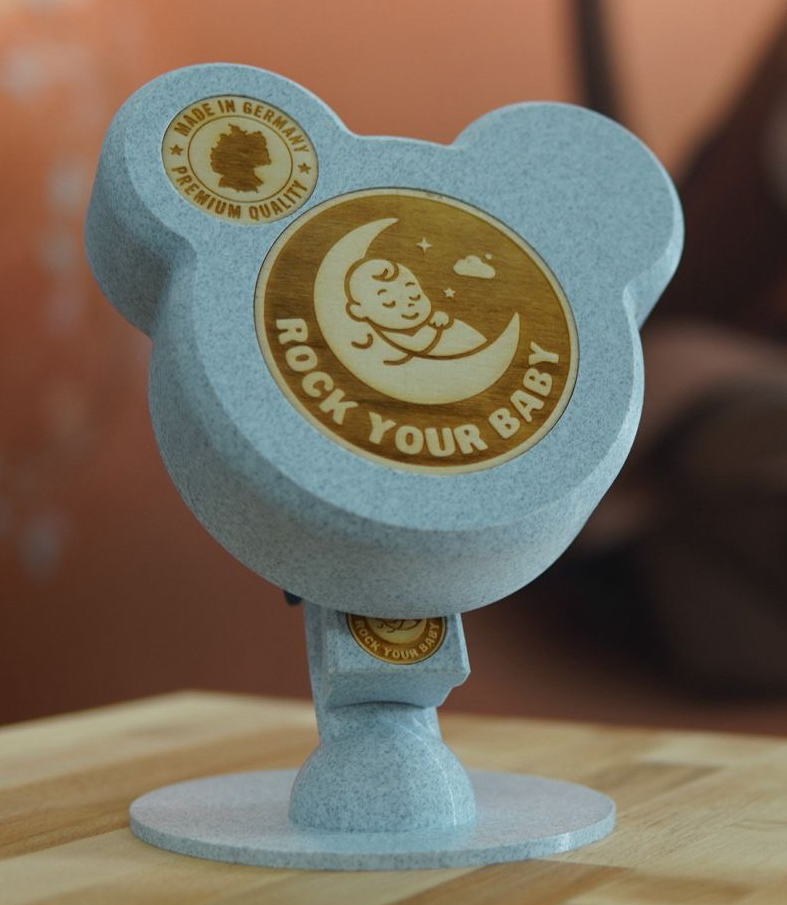 ROCK your BABY Produktansicht im Zentrum der Vorteilsübersicht.